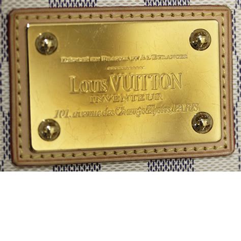 louis vuitton tag inside|Louis Vuitton engraving.